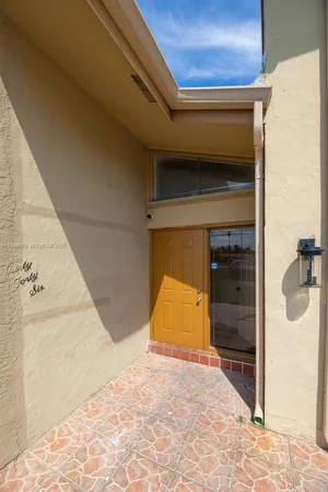 a bathroom with a tub and shower