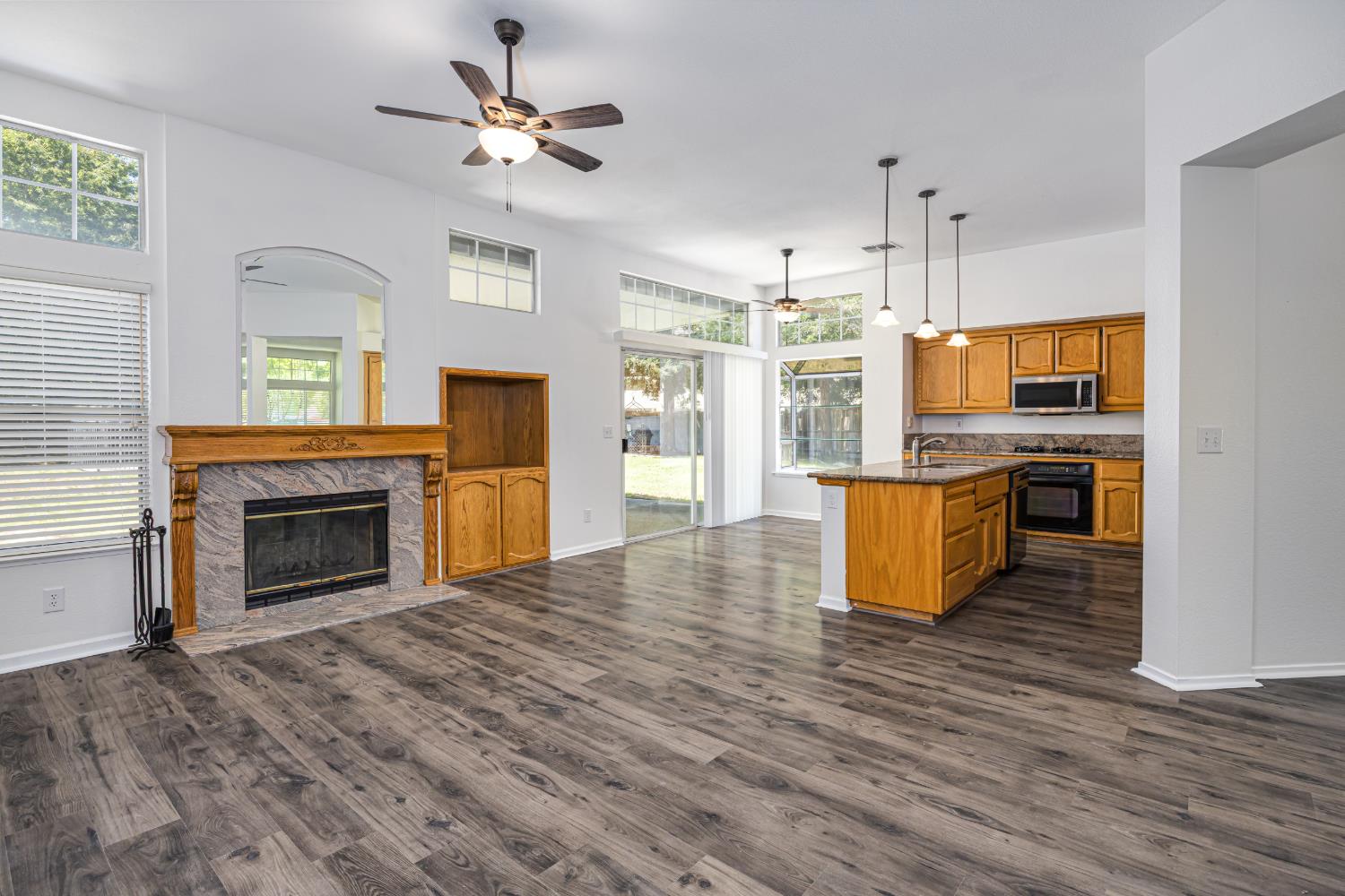 9282 Dever Circle Elk Grove, CA 95624 - Photo 18 of 38 FAMILY ROOM AND KITCHEN WITH BREAKFAST NOOK