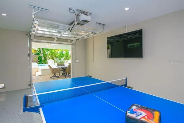 a room with furniture and a flat screen tv