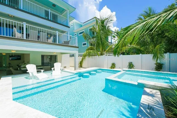 a view of a house with a swimming pool