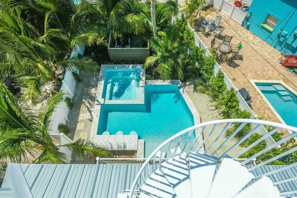 a view of a balcony with chair