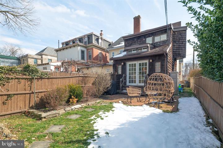 229 Benezet Street Philadelphia, PA 19118 - Photo 13 of 31 a front view of a house with garden