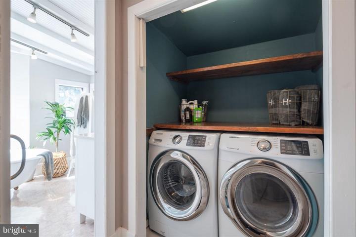 229 Benezet Street Philadelphia, PA 19118 - Photo 20 of 31 a utility room with dryer and washer