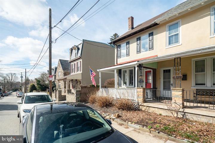 229 Benezet Street Philadelphia, PA 19118 - Photo 28 of 31 a front view of a house with garden