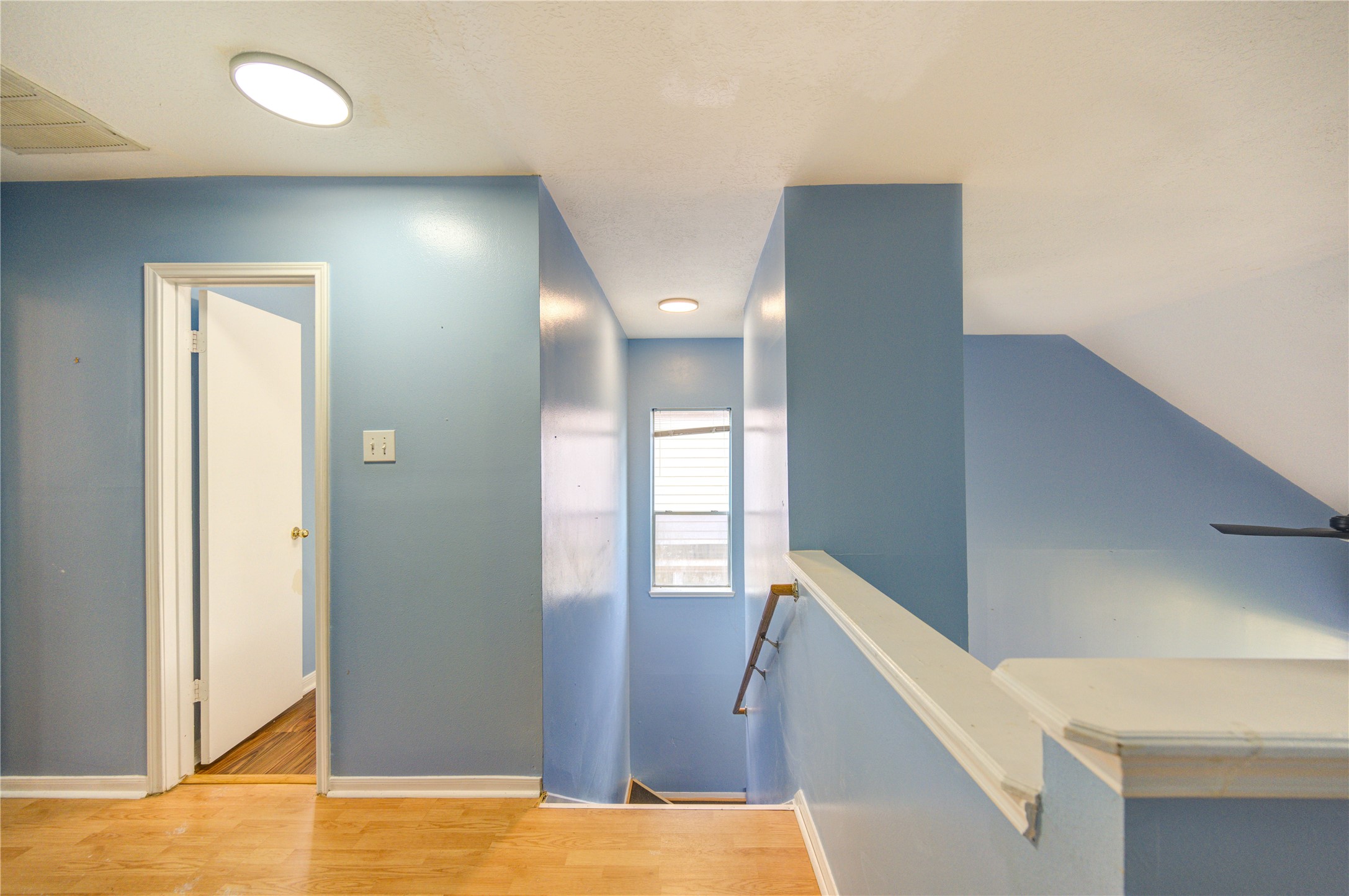 10338 Timberloch Drive Houston, TX 77070 - Photo 13 of 22 a view of an empty room and window