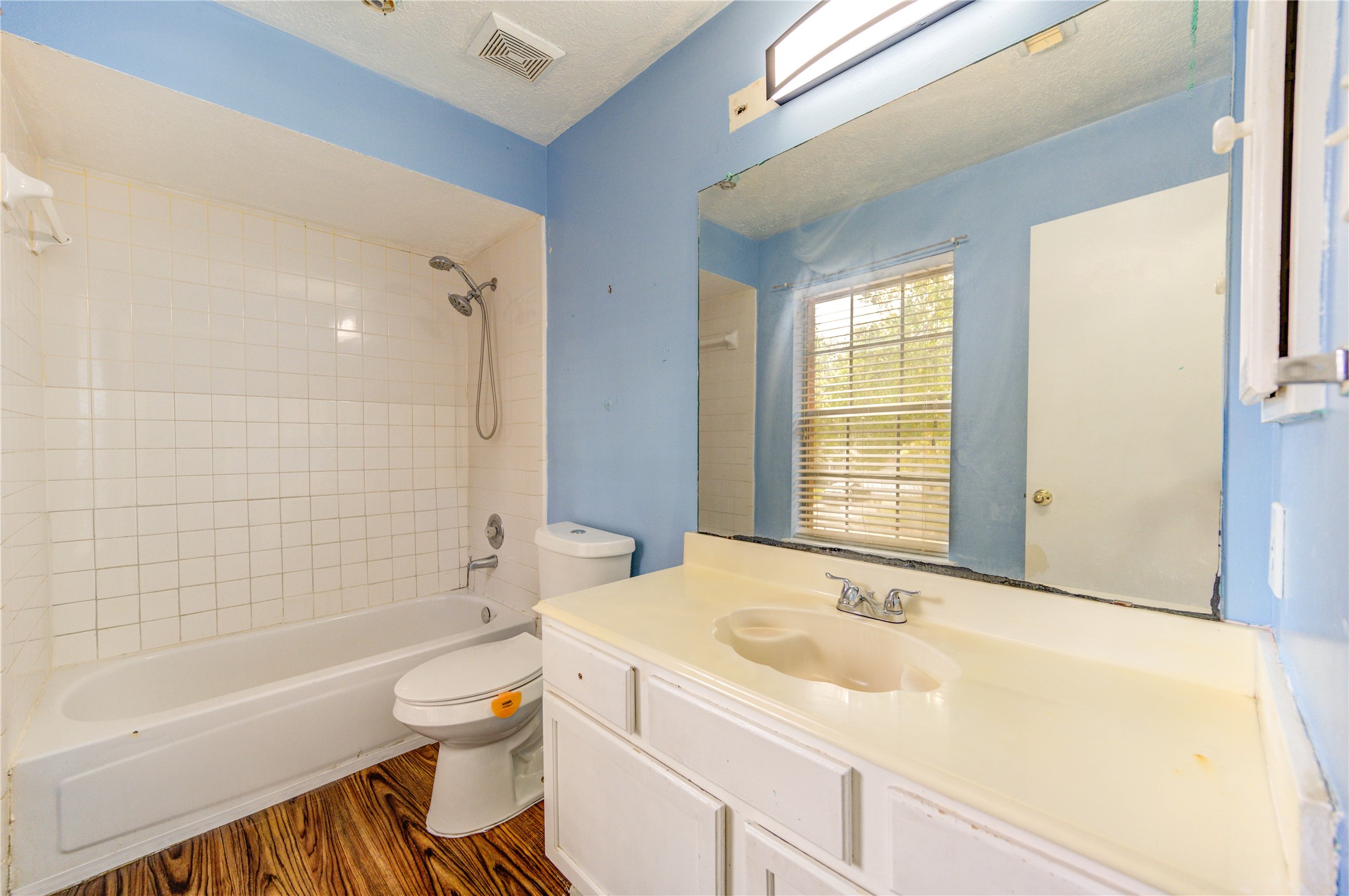 10338 Timberloch Drive Houston, TX 77070 - Photo 20 of 22 a bathroom with a sink toilet tub and shower
