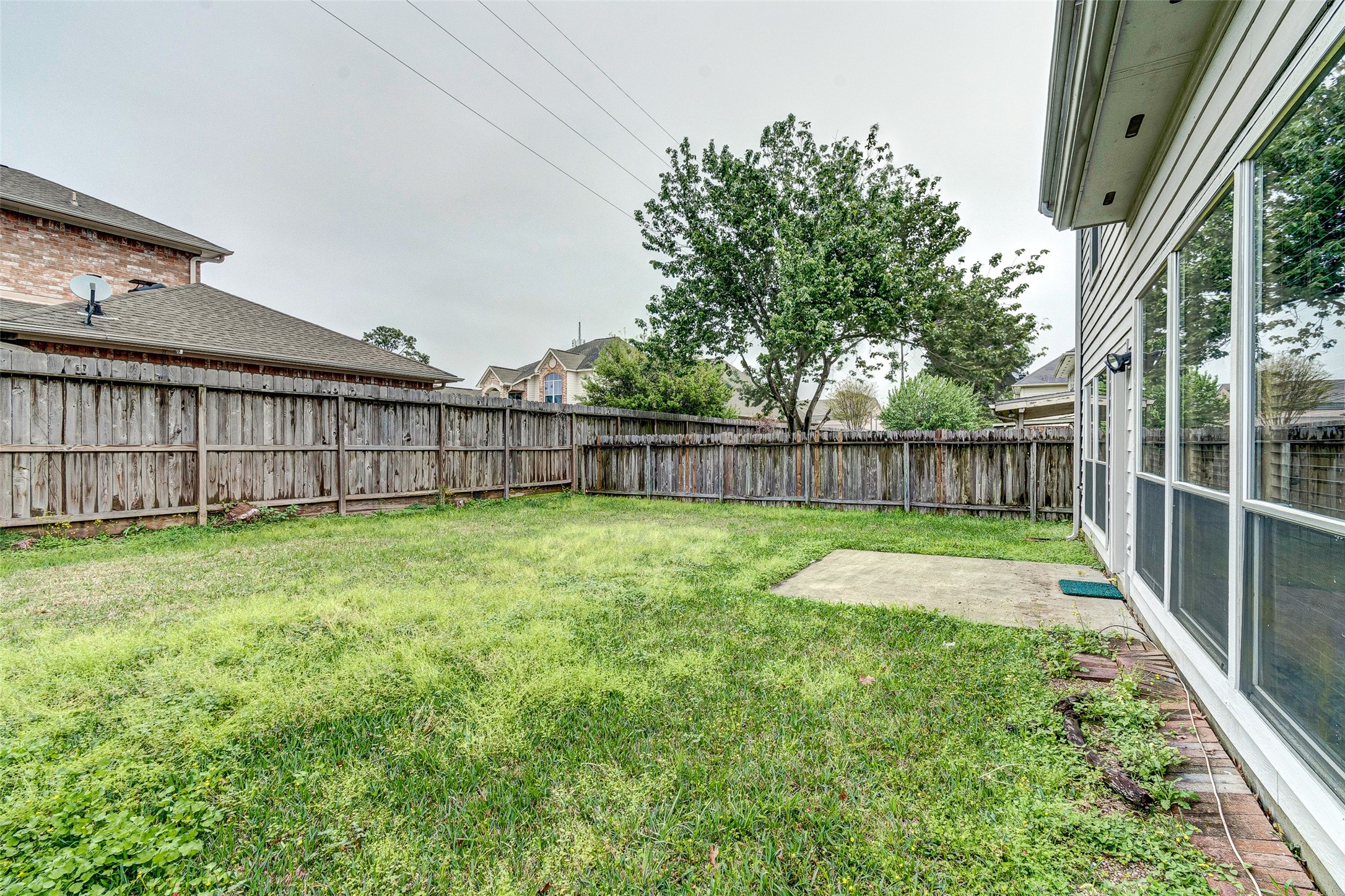 10338 Timberloch Drive Houston, TX 77070 - Photo 22 of 22 a view of backyard with green space