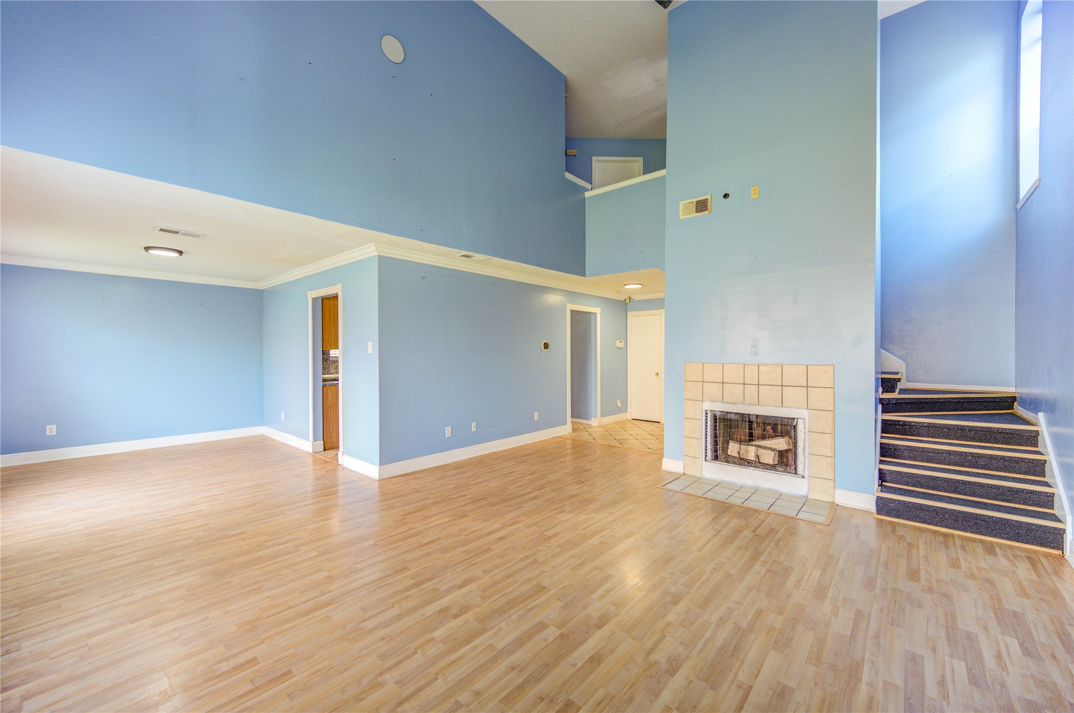 10338 Timberloch Drive Houston, TX 77070 - Photo 3 of 22 a view of empty room with wooden floor