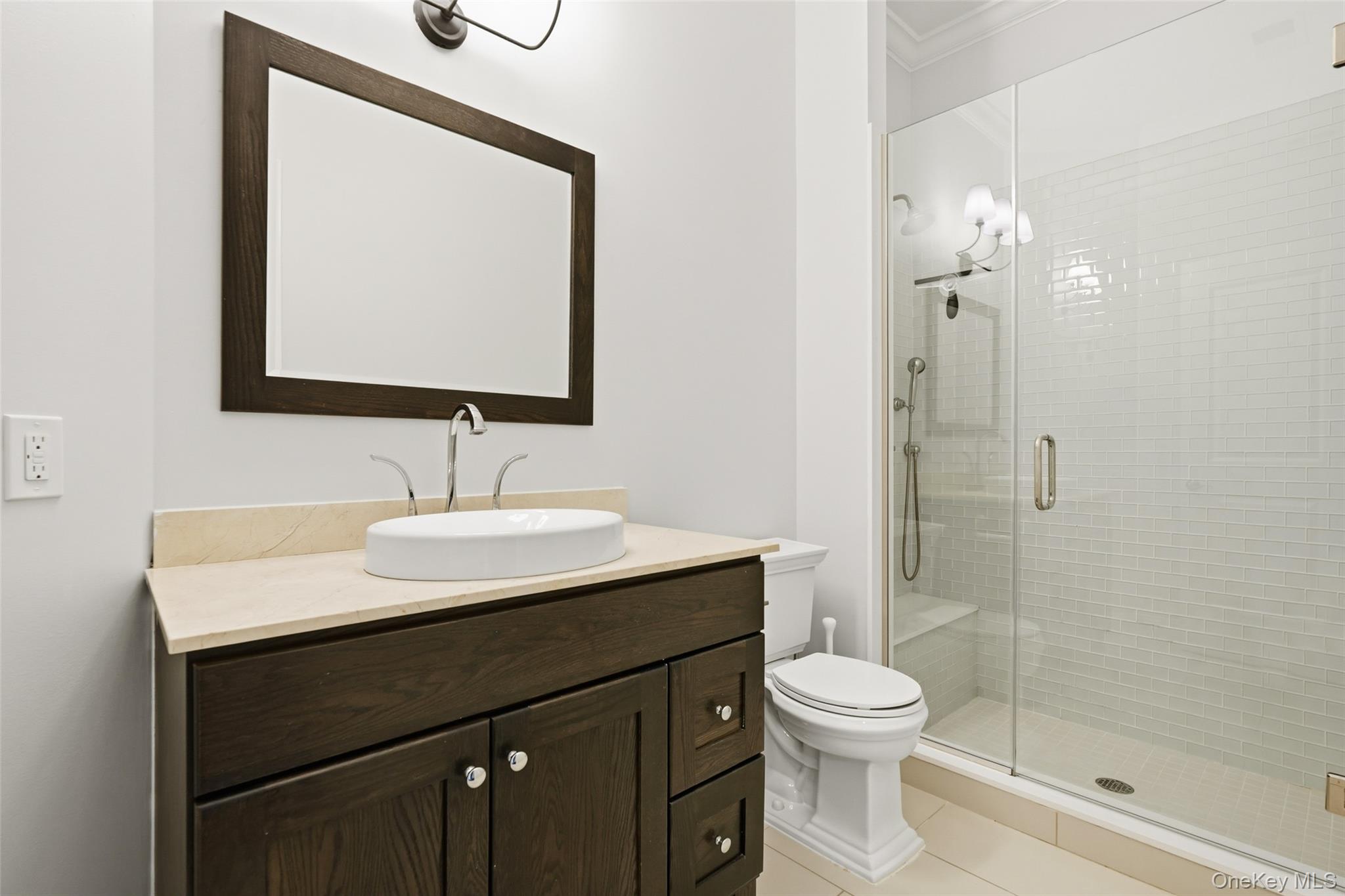 21 Rivers Edge Drive Tarrytown, NY 10591 - Photo 11 of 28 a bathroom with a sink a toilet and shower