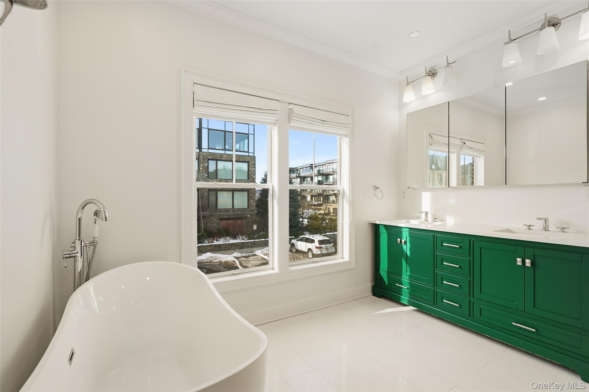 21 Rivers Edge Drive Tarrytown, NY 10591 - Photo 20 of 28 a spacious bathroom with a tub sink and mirror