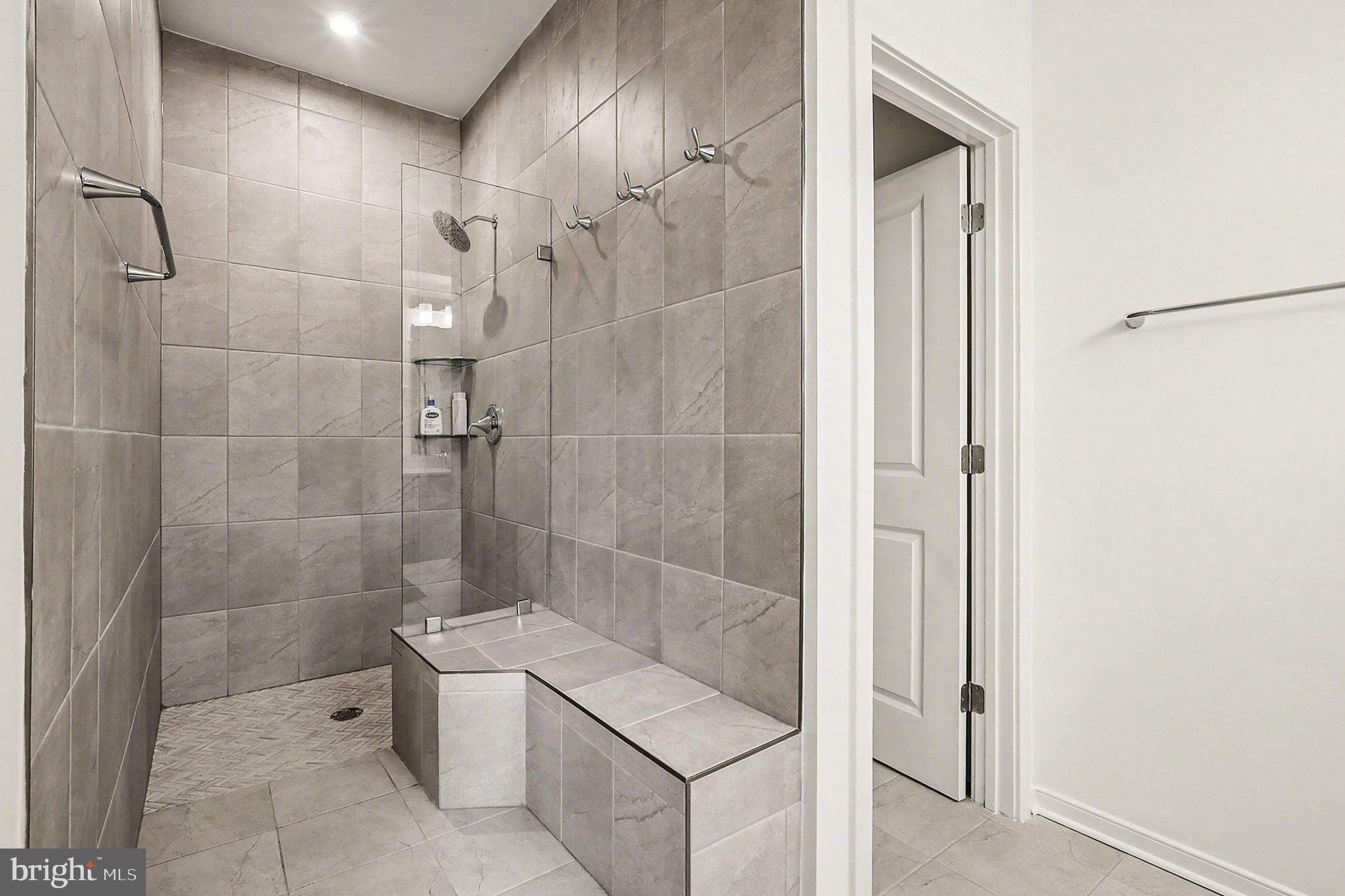 45956 Swallow Terrace Sterling, VA 20165 - Photo 13 of 29 a bathroom with a shower and a sink