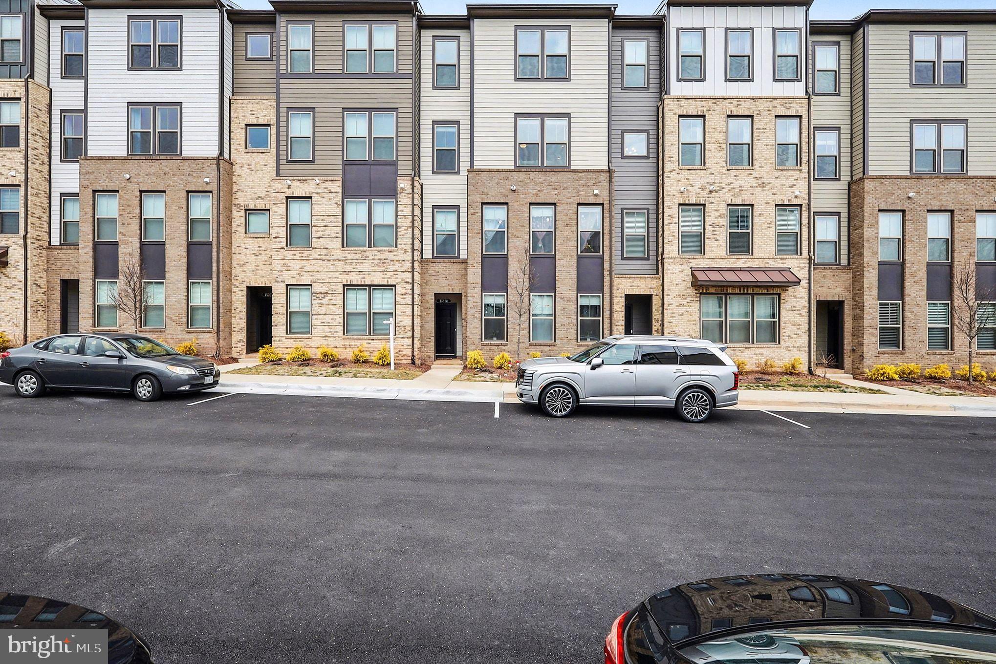 45956 Swallow Terrace Sterling, VA 20165 - Photo 2 of 29 a view of a street with cars