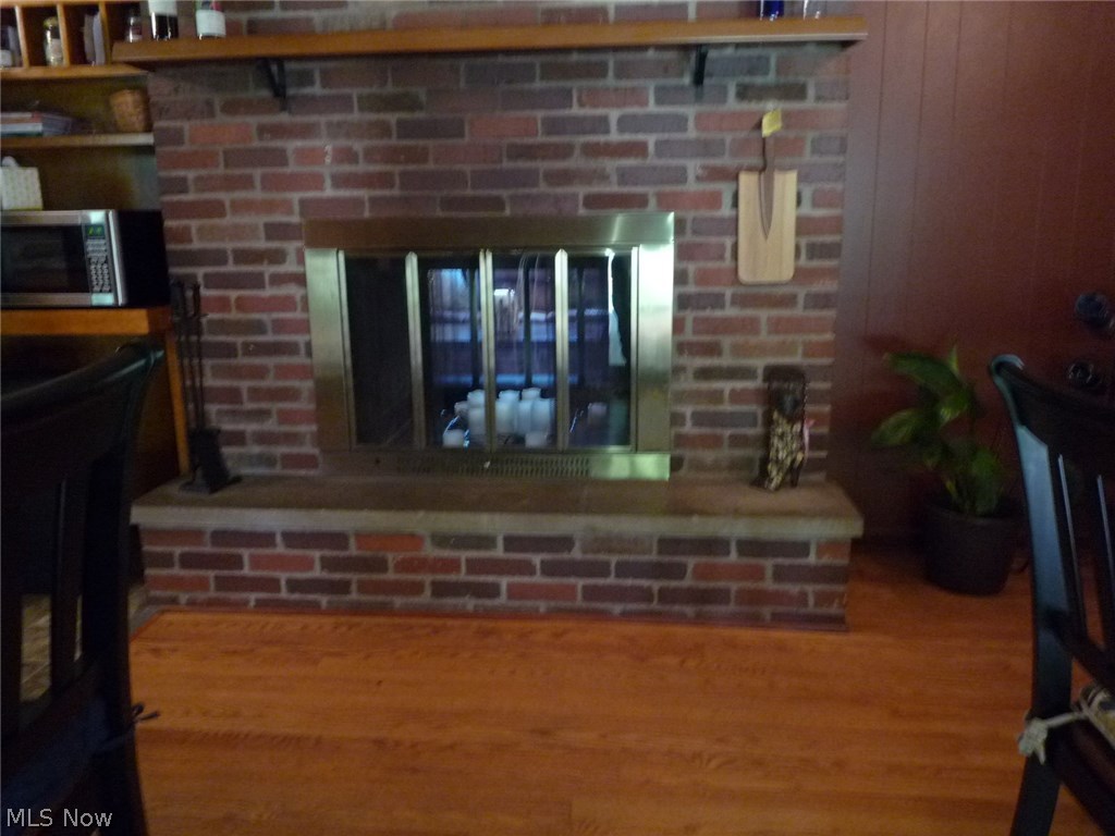 107 Robson Road Marietta, OH 45750 - Photo 6 of 31 Wood burning fireplace is See-through to Living room.
