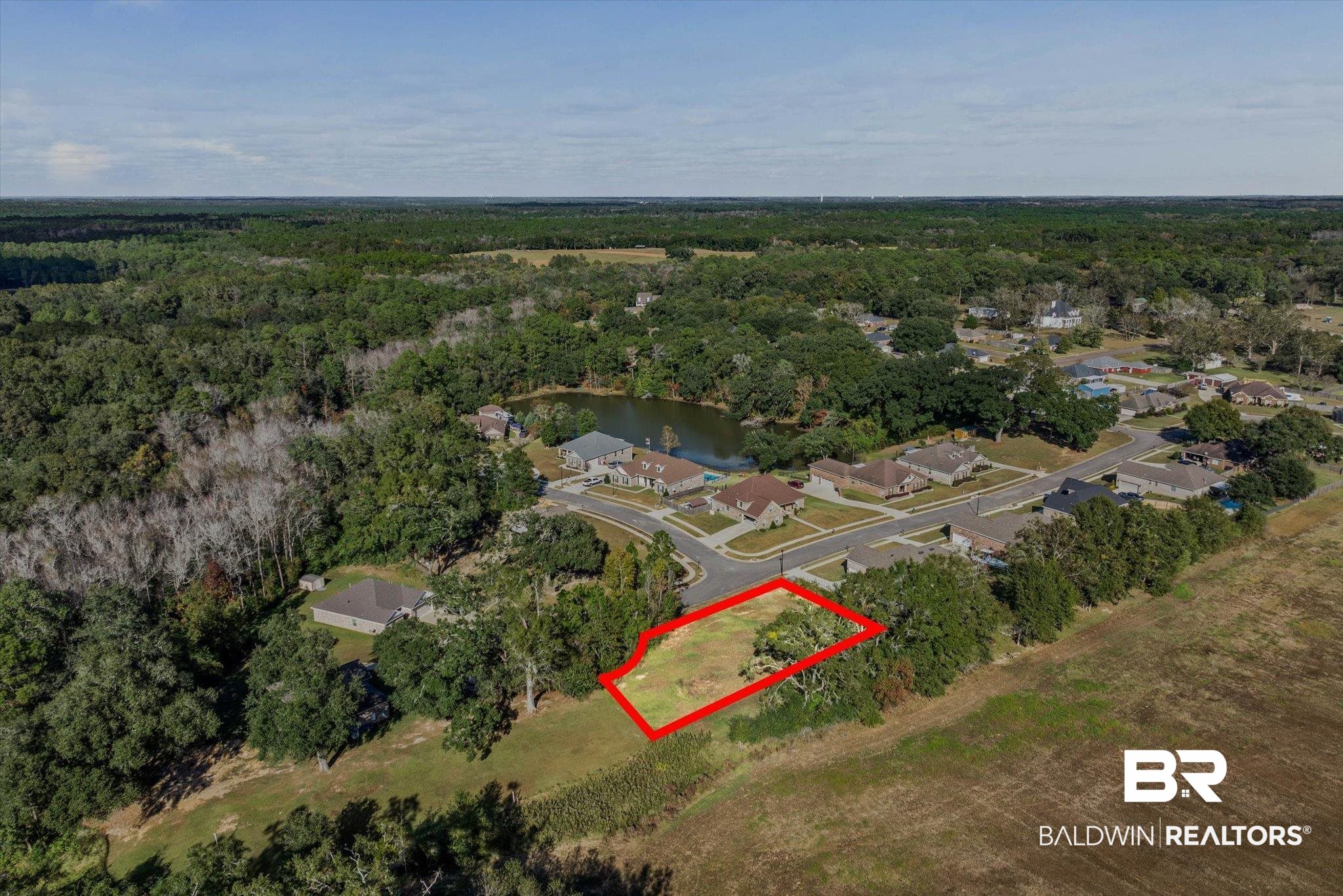 0 Acorn Way Grand Bay, AL 36541 - Photo 9 of 17 Aerial view of property's location featuring property parcel outlined and nearby suburban area