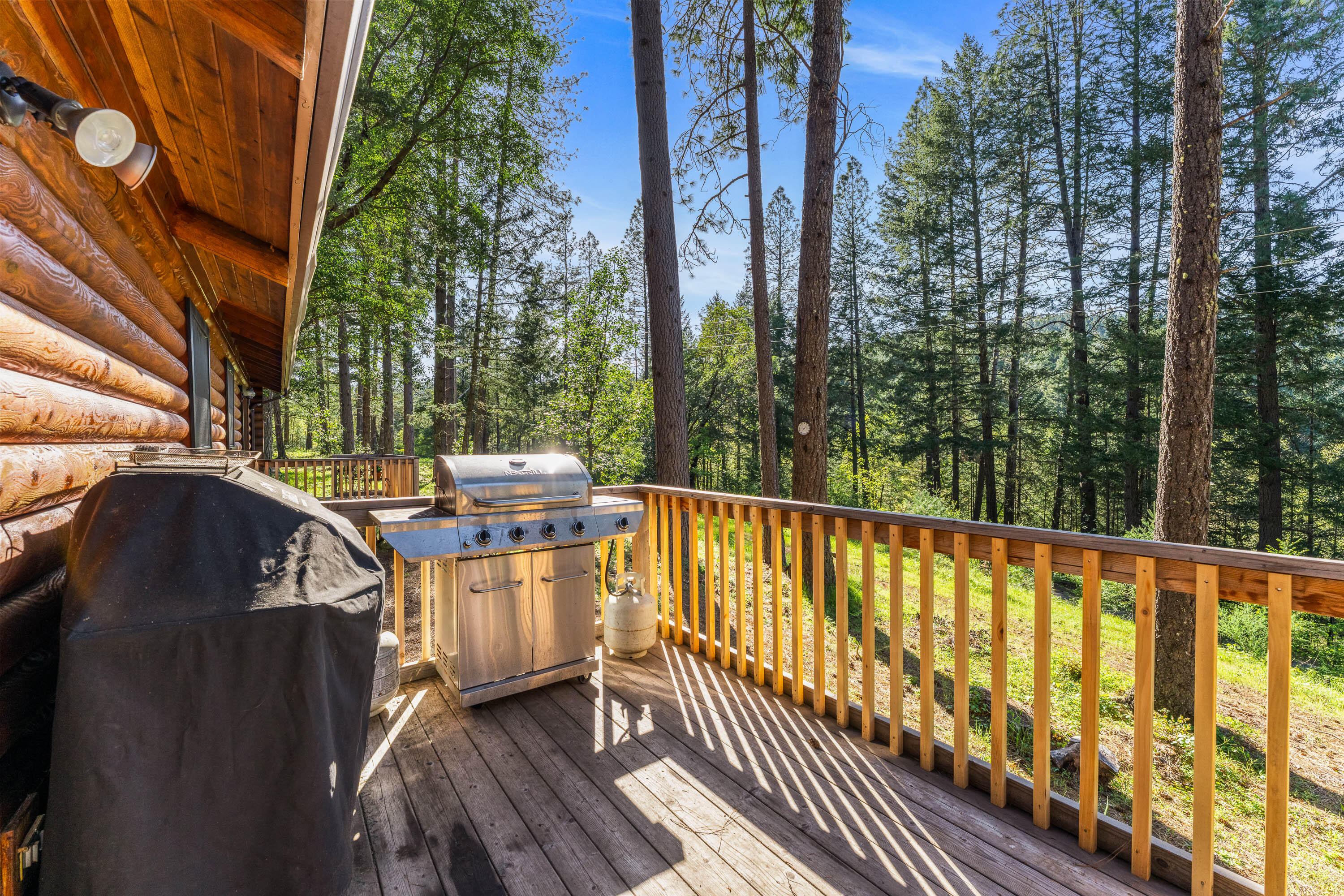 1201 Reeves Creek Road Selma, OR 97538 - Photo 22 of 38 a view of a balcony with wooden floor