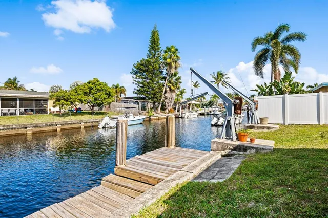 a house view with swimming pool and outdoor space