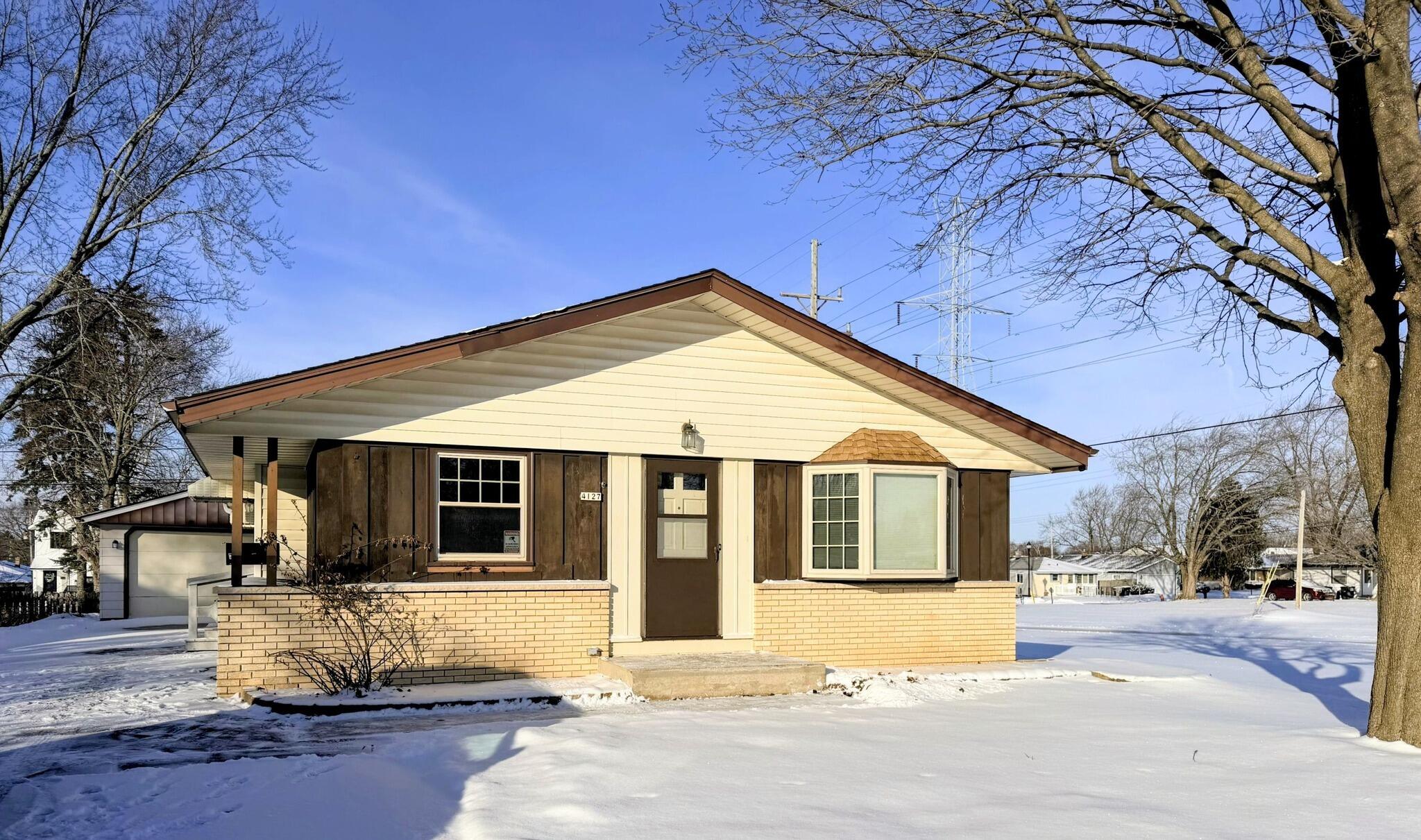 4127 South 89th Street Greenfield, WI 53228 - Photo 37 of 37 front snow