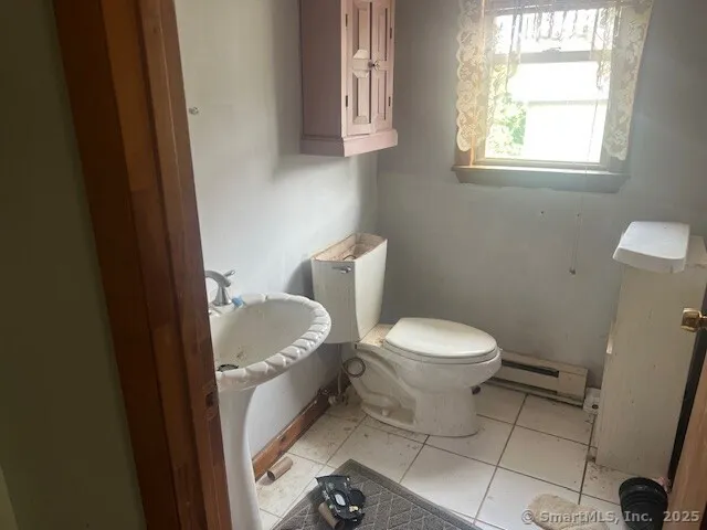 a bathroom with a sink and shower