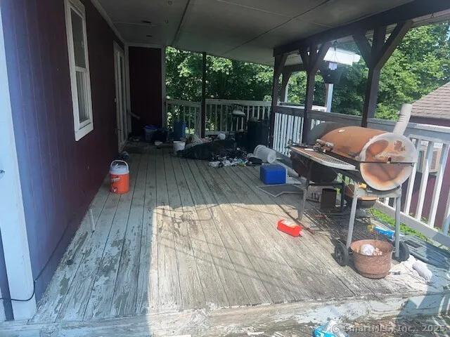 swimming pool view with a seating space