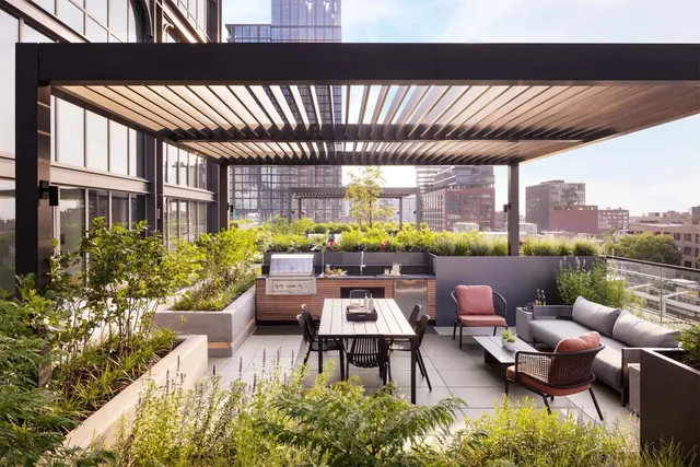 a outdoor living space with furniture and a potted plant