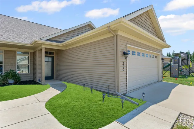 a view of a back yard of the house