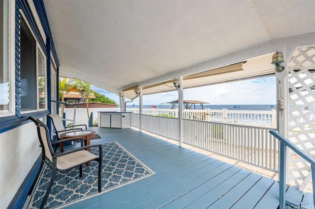 a room with furniture and a large window
