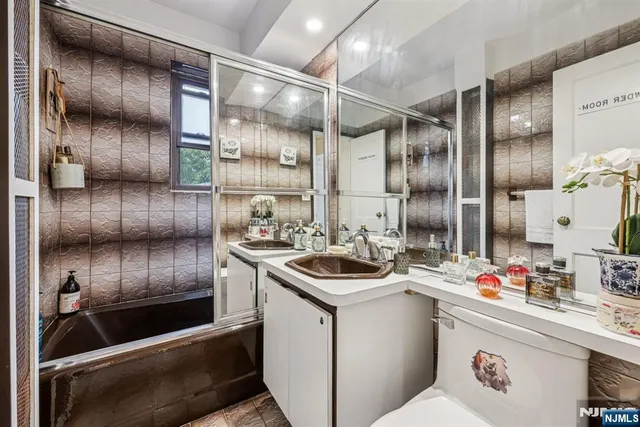 a kitchen with a sink and refrigerator