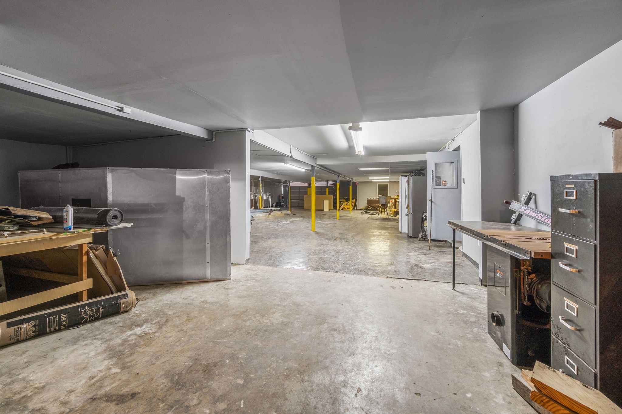 1018 Shaver Street Pasadena, TX 77506 - Photo 42 of 43 Expansive warehouse area with open floor plan and multiple work zones.