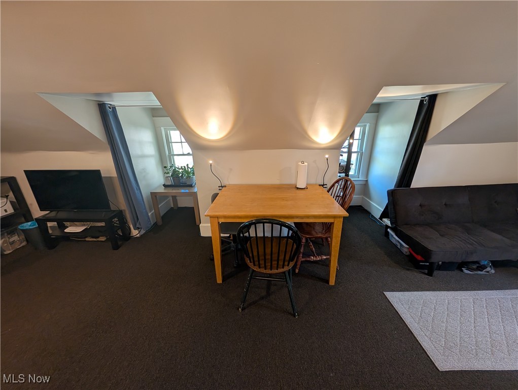 2108 Stillman Road, Unit 3 Cleveland, OH 44118 - Photo 8 of 14 Dining area with dark colored carpet and baseboards