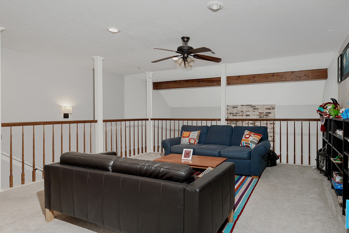 5 Indian Cedar Lane The Woodlands, TX 77380 - Photo 18 of 26 a living room with furniture and a wooden floor