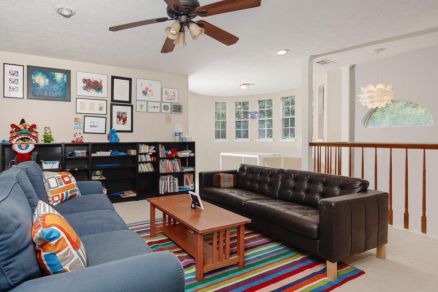 5 Indian Cedar Lane The Woodlands, TX 77380 - Photo 19 of 26 a living room with furniture cabinets and window