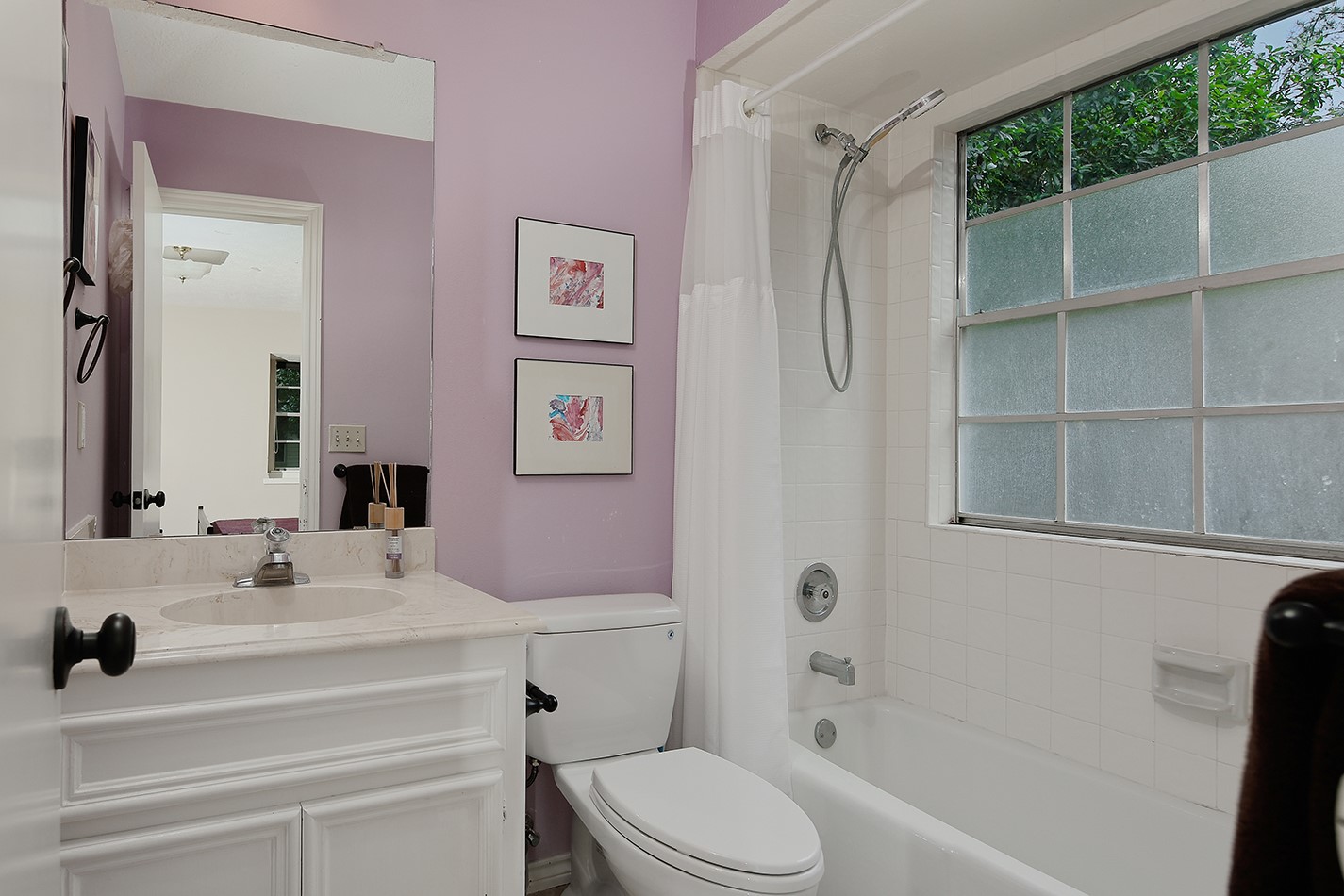 5 Indian Cedar Lane The Woodlands, TX 77380 - Photo 21 of 26 a bathroom with a sink toilet and shower