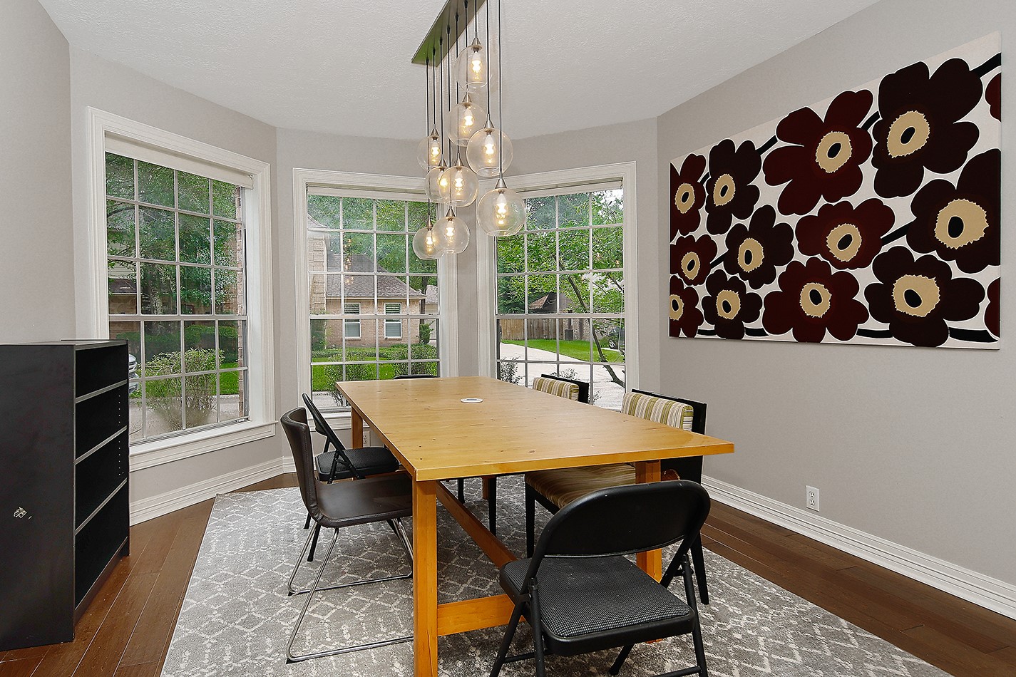 5 Indian Cedar Lane The Woodlands, TX 77380 - Photo 5 of 26 a view of a dining room with furniture window and outside view