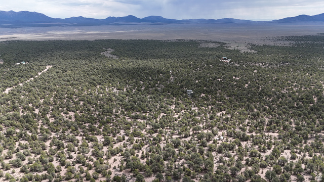 St, Unit 1 & 2 Modena, UT 84753 - Photo 25 of 69 Expansive land parcel featuring dense tree coverage and distant mountain ranges
