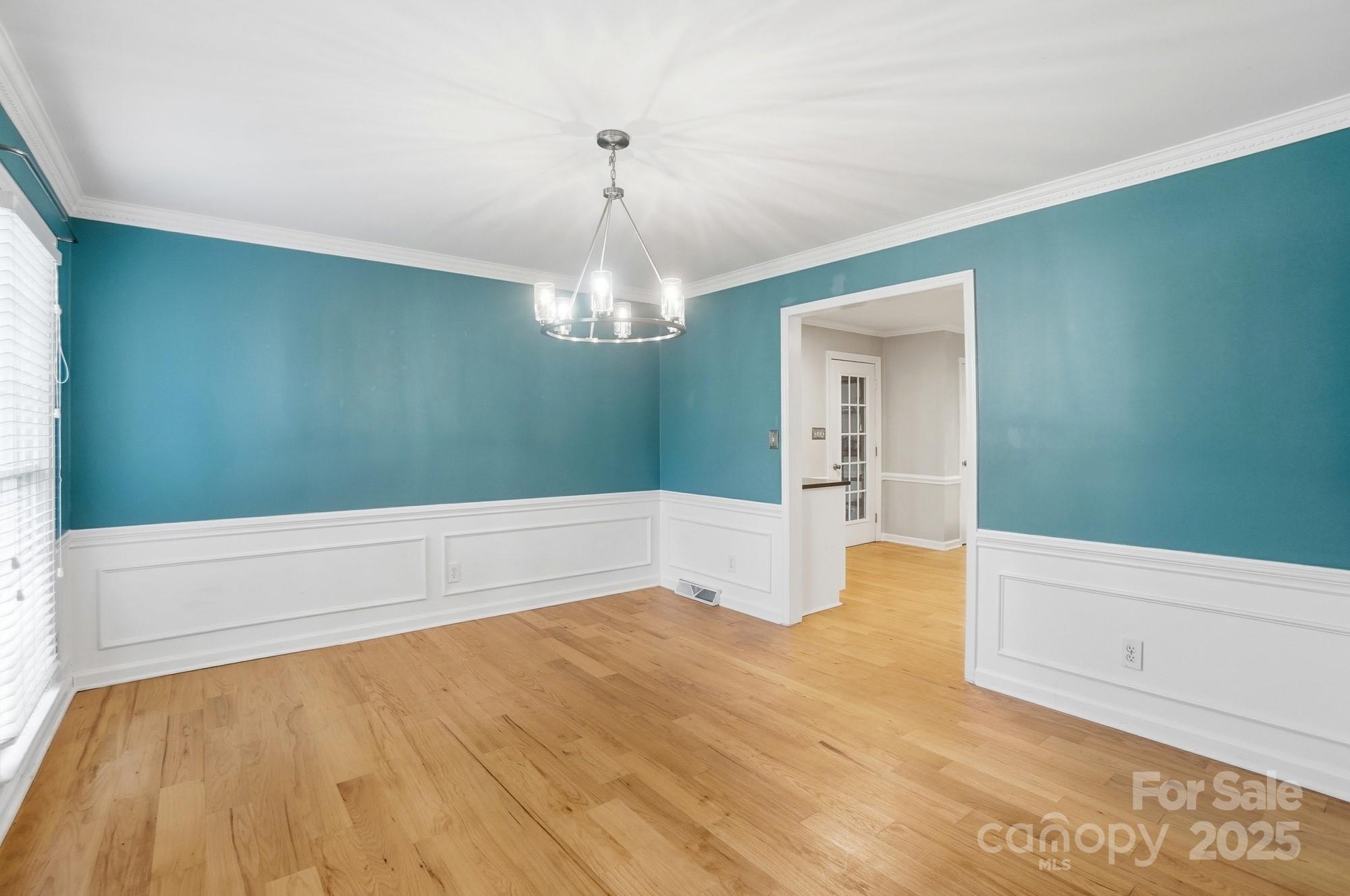 1308 Dumbarton Road Gastonia, NC 28054 - Photo 12 of 48 a spacious bathroom with a bathtub and chandelier
