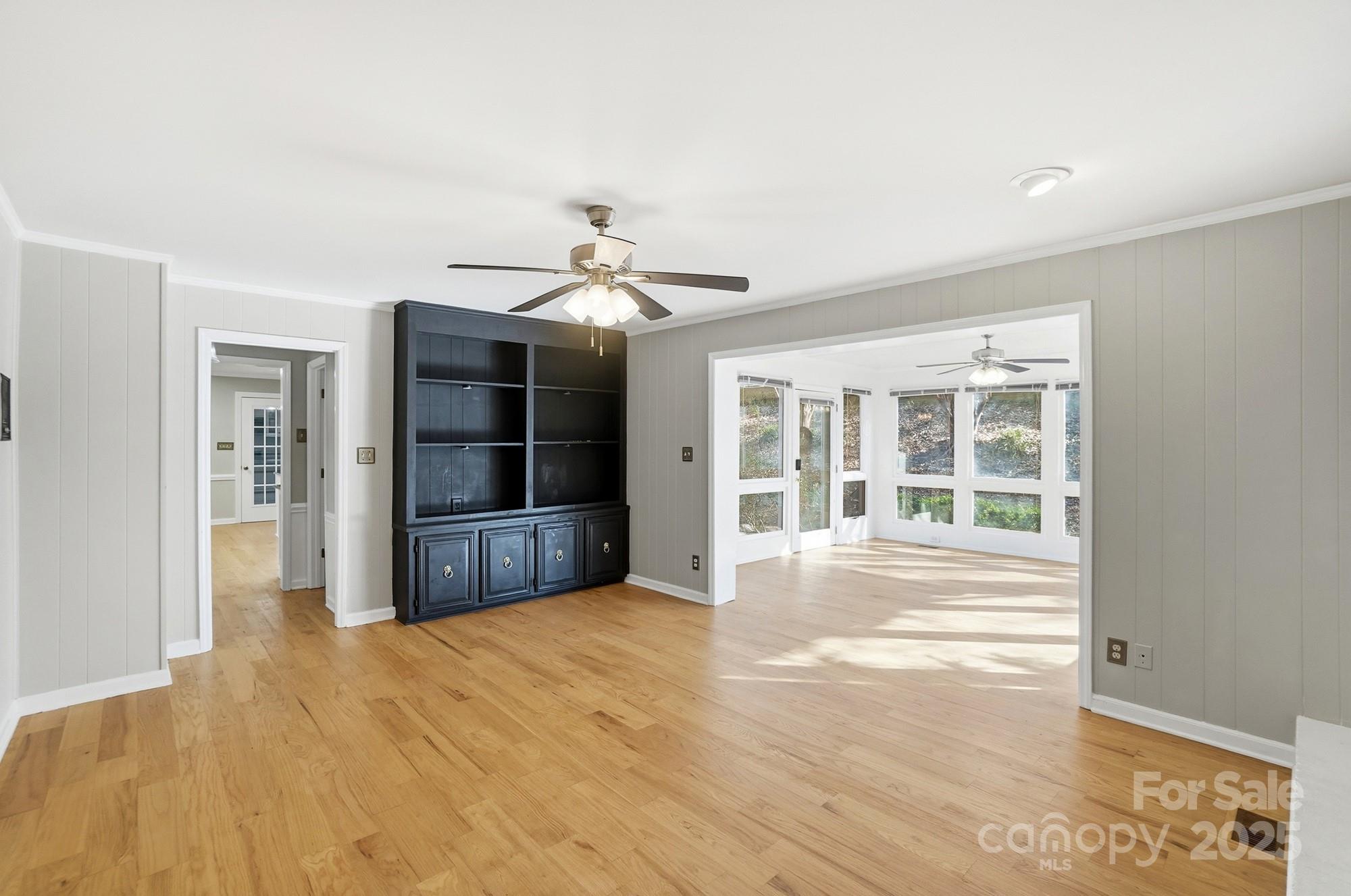 1308 Dumbarton Road Gastonia, NC 28054 - Photo 28 of 48 a view of an empty room with a window and kitchen view