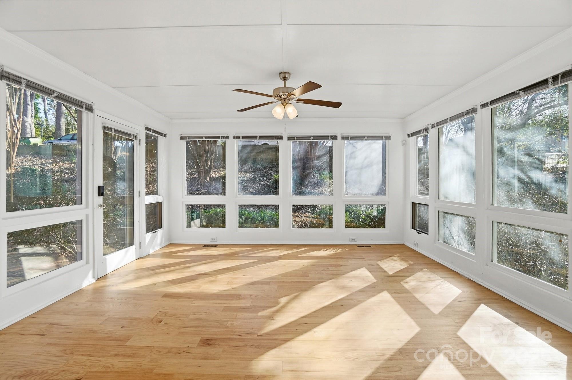 1308 Dumbarton Road Gastonia, NC 28054 - Photo 30 of 48 a view of an empty room with a window and a fireplace