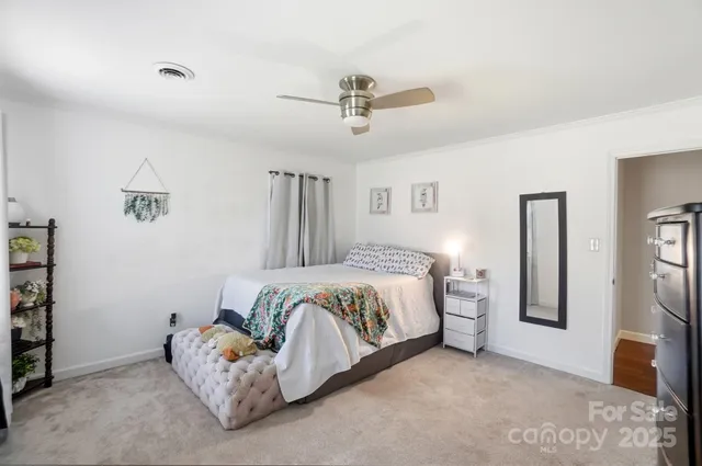 a bedroom with a bed and a cabinets
