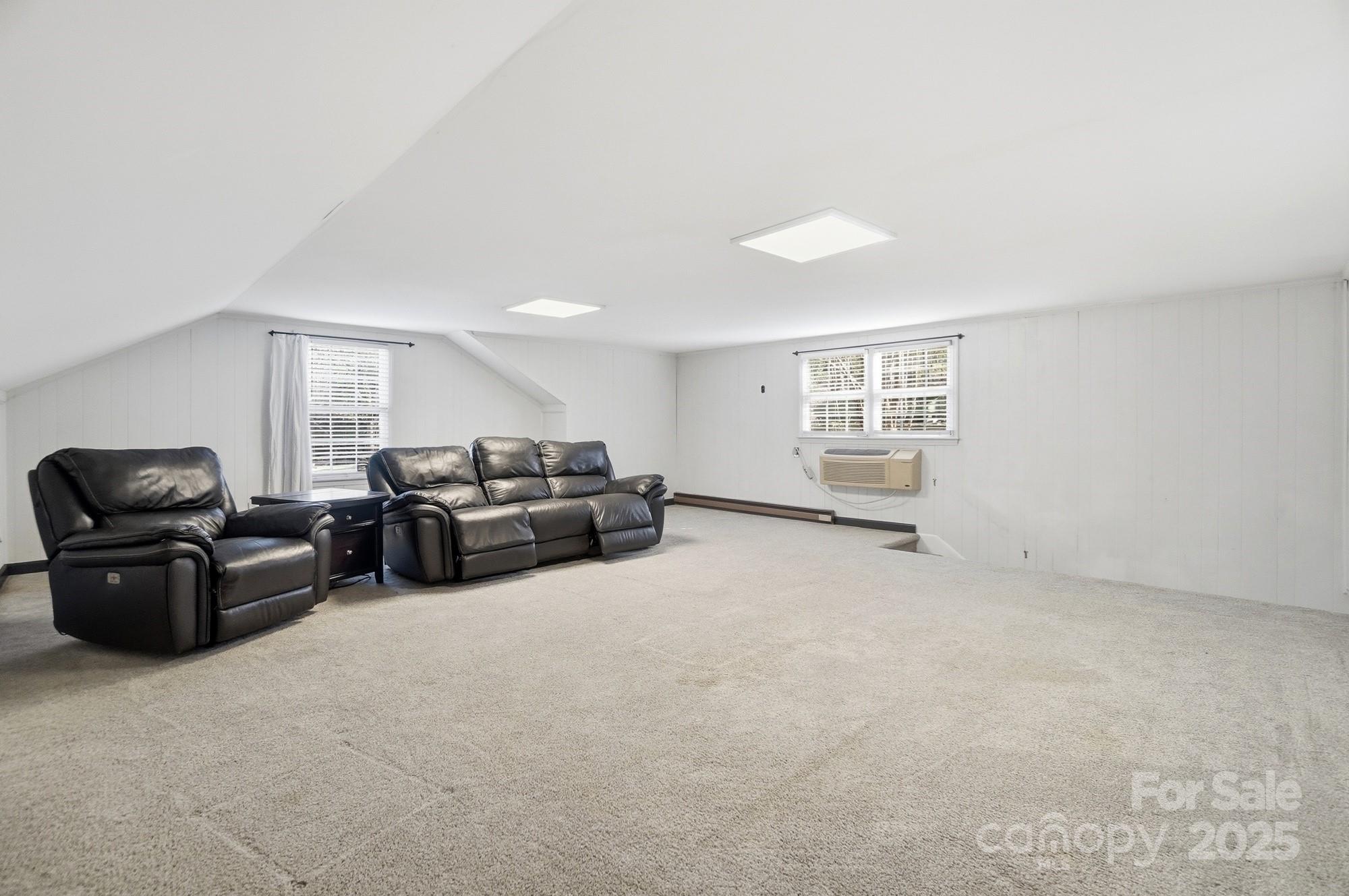 1308 Dumbarton Road Gastonia, NC 28054 - Photo 45 of 48 a living room with furniture and a couch