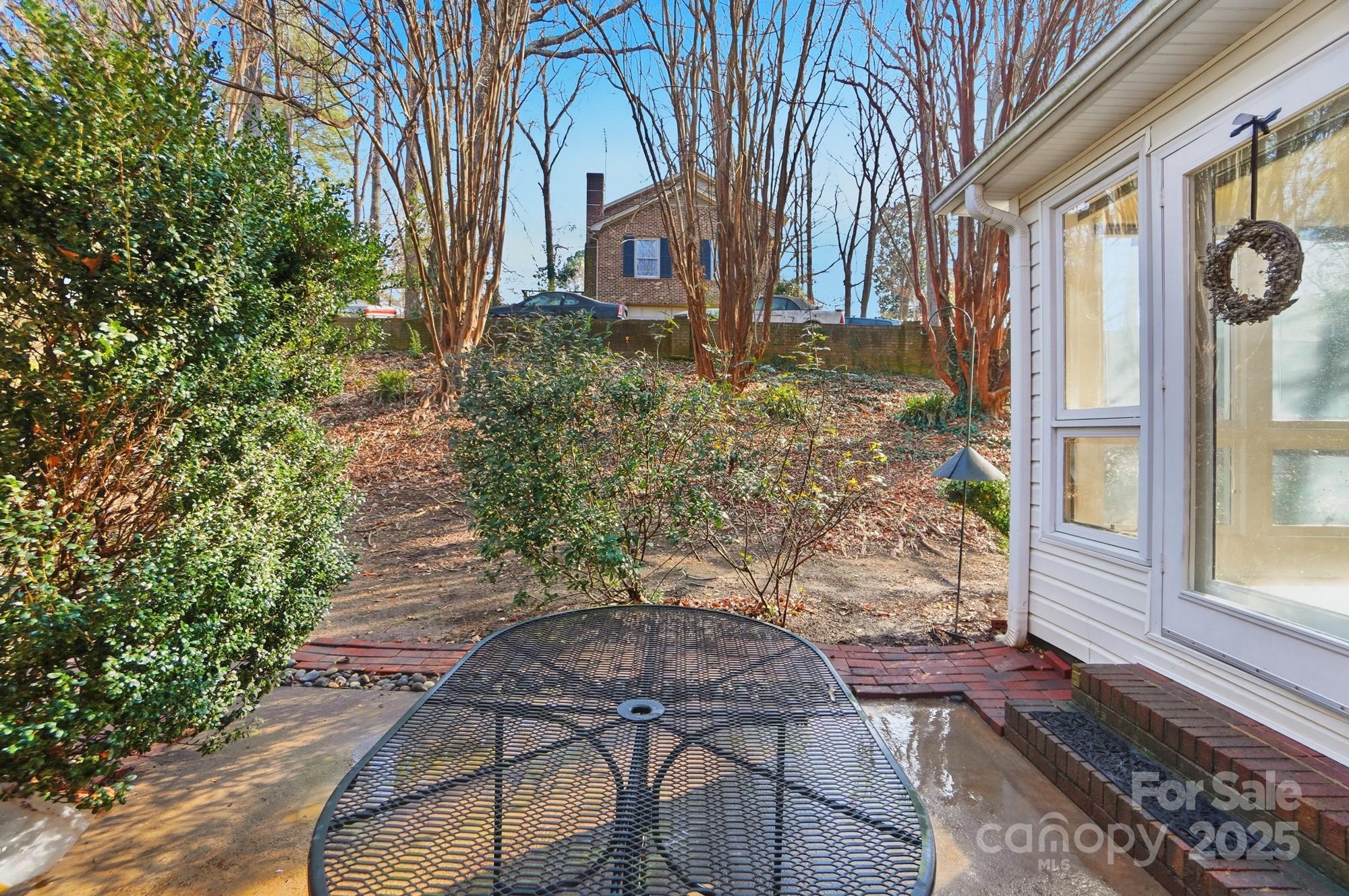 1308 Dumbarton Road Gastonia, NC 28054 - Photo 46 of 48 a front view of a house with garden