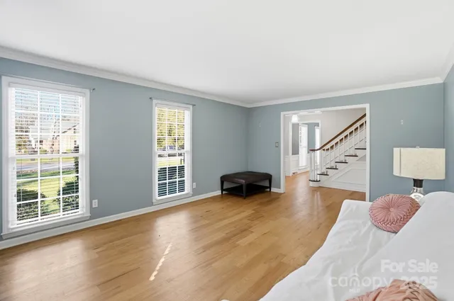 a view of livingroom with furniture and staircase