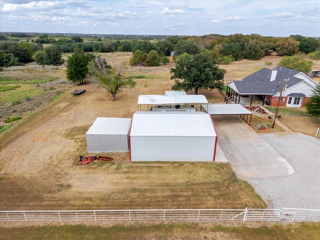 2400 Springfield Road Springtown, TX 76082 - Photo 25 of 31 Double care carport and RV Carport along with plenty of parking area