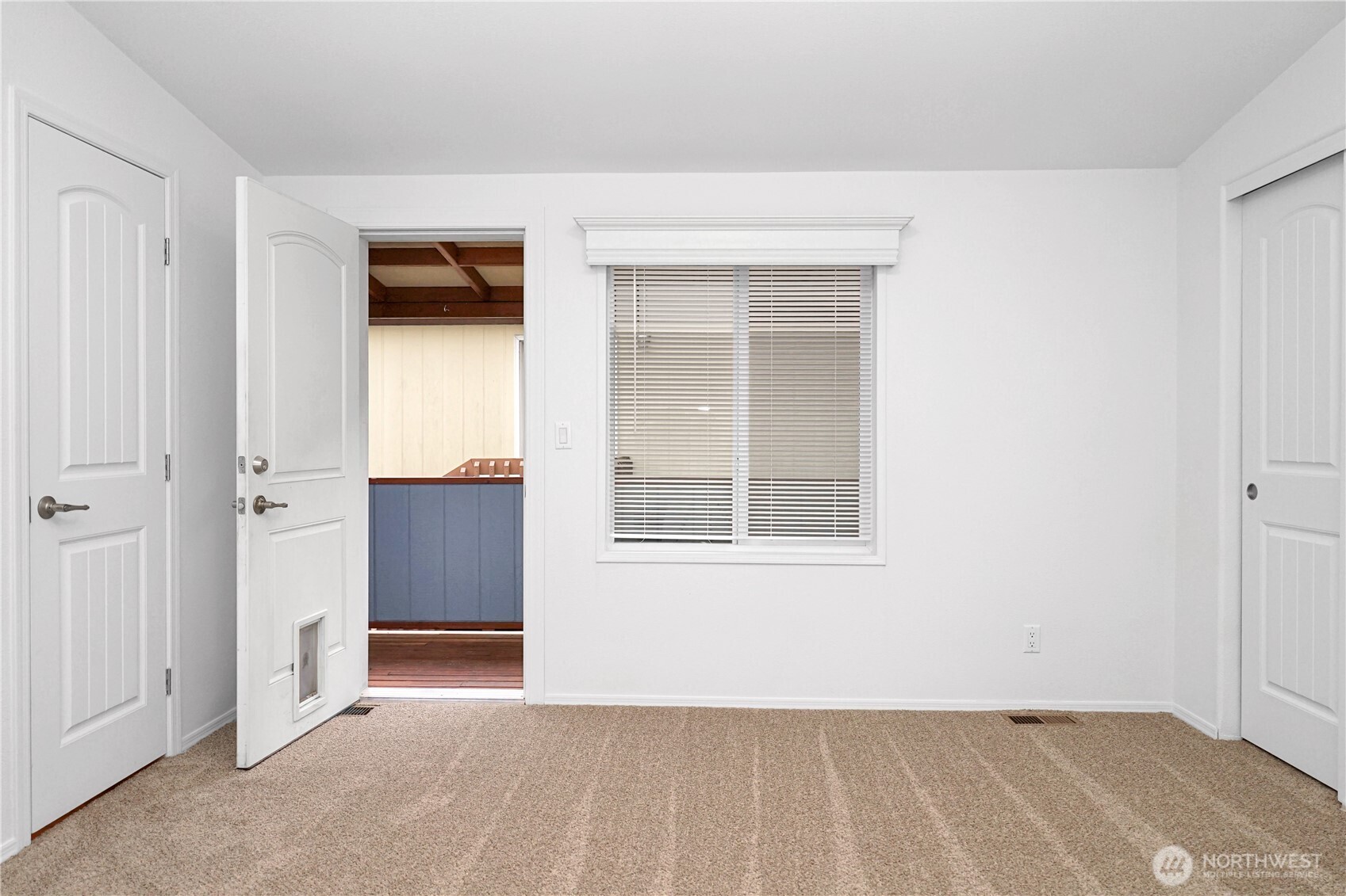 15231 Pine Drive Renton, WA 98058 - Photo 17 of 29 an empty room with windows