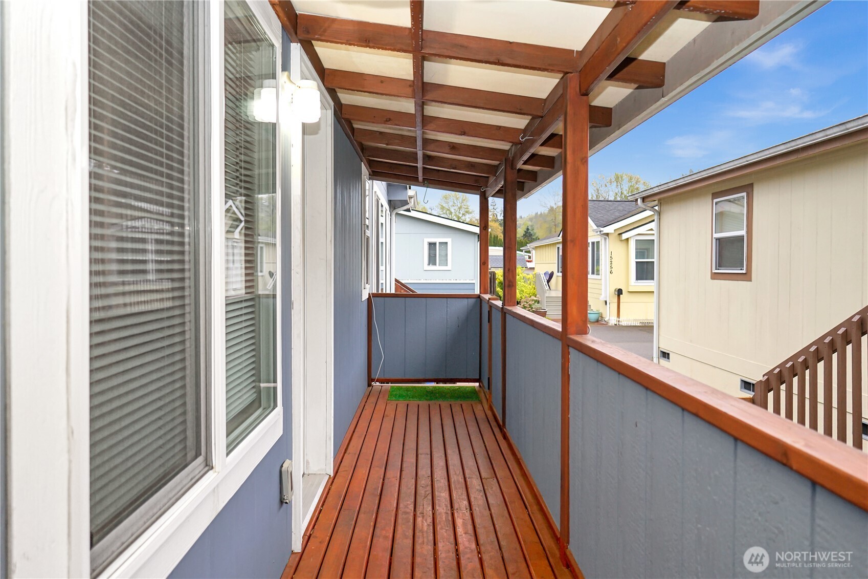 15231 Pine Drive Renton, WA 98058 - Photo 22 of 29 a view of a balcony with wooden floor