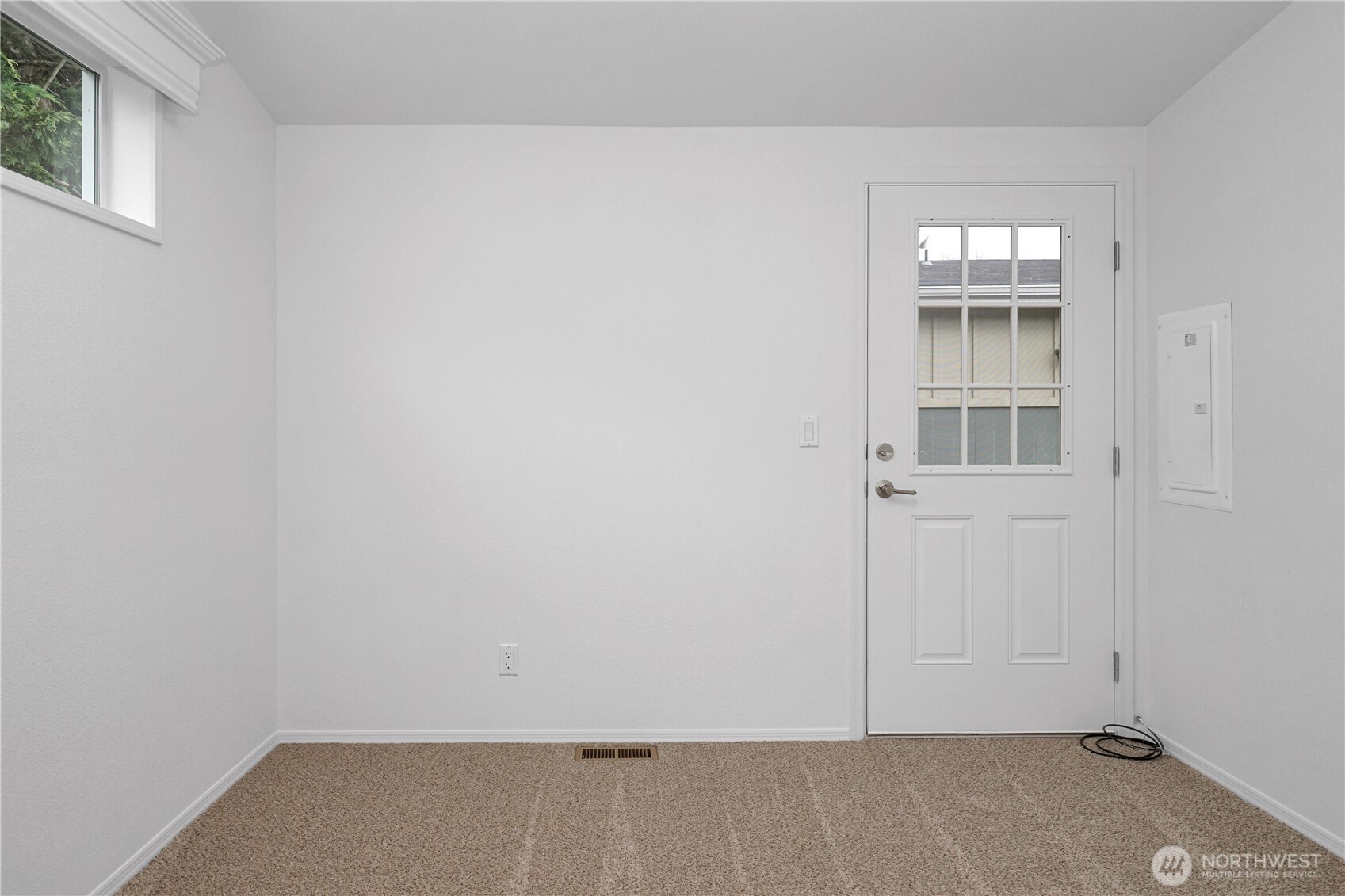 15231 Pine Drive Renton, WA 98058 - Photo 24 of 29 an empty room with windows
