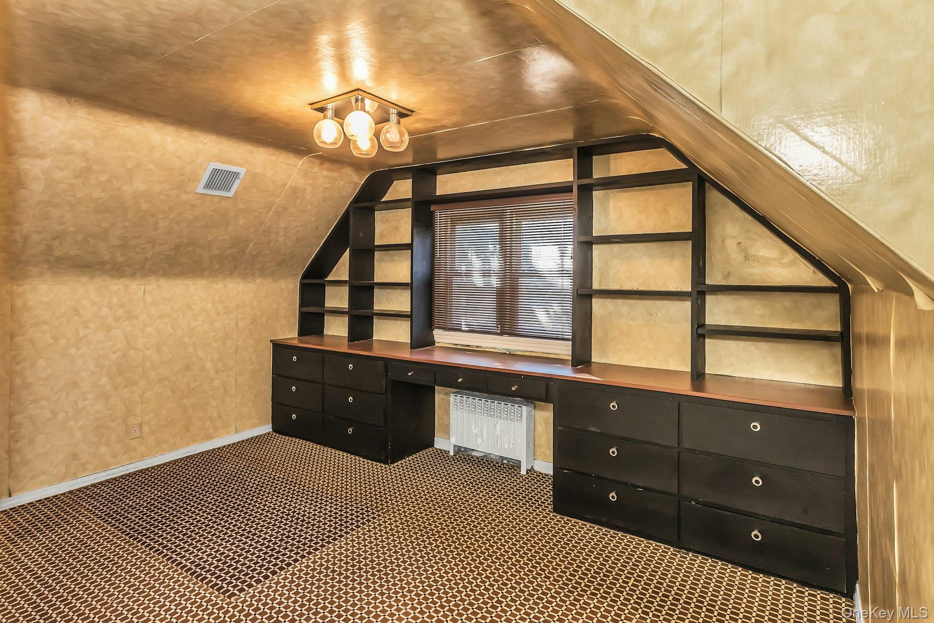 11 Rockhill Road East Hills, NY 11577 - Photo 21 of 27 a spacious bedroom with a bed and a window