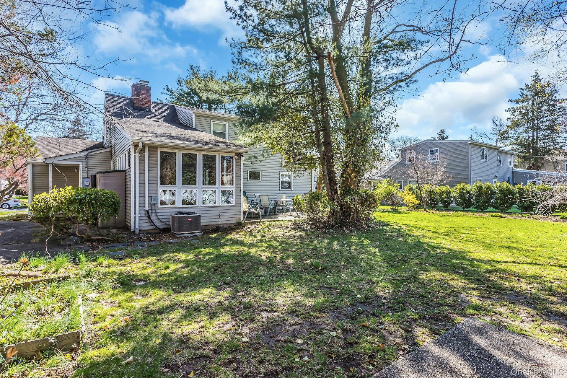 11 Rockhill Road East Hills, NY 11577 - Photo 26 of 27 a view of a house with a yard balcony