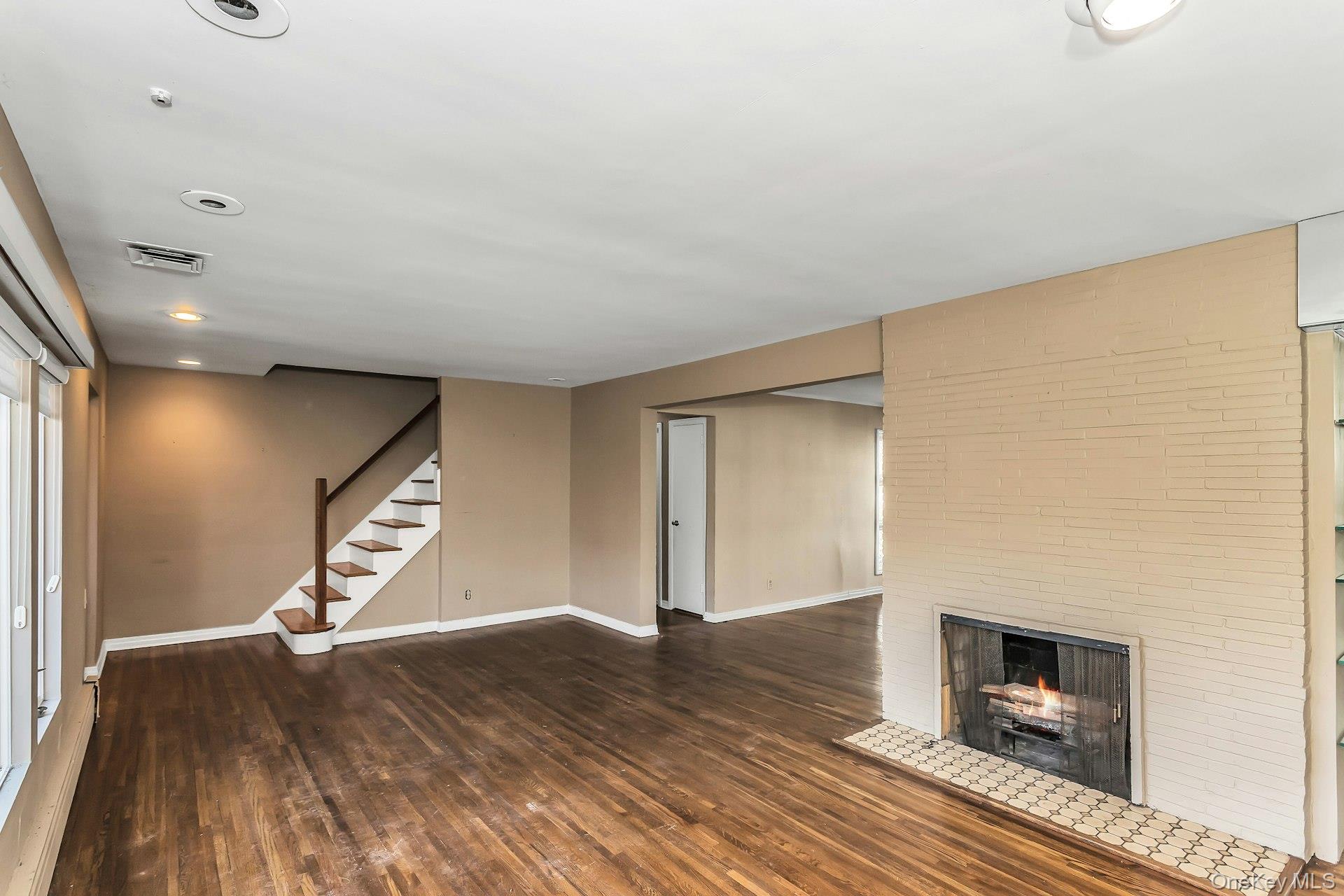 11 Rockhill Road East Hills, NY 11577 - Photo 5 of 27 a view of empty room with wooden floor