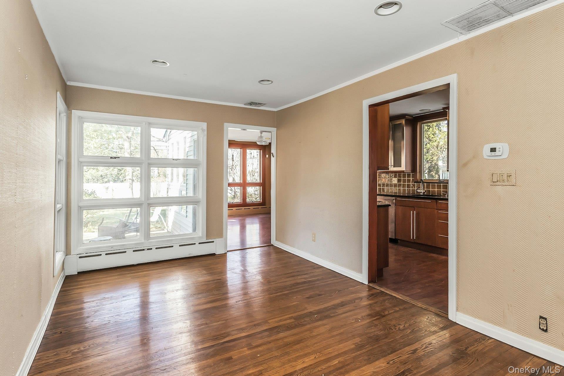 11 Rockhill Road East Hills, NY 11577 - Photo 7 of 27 wooden floor in an empty room with a window