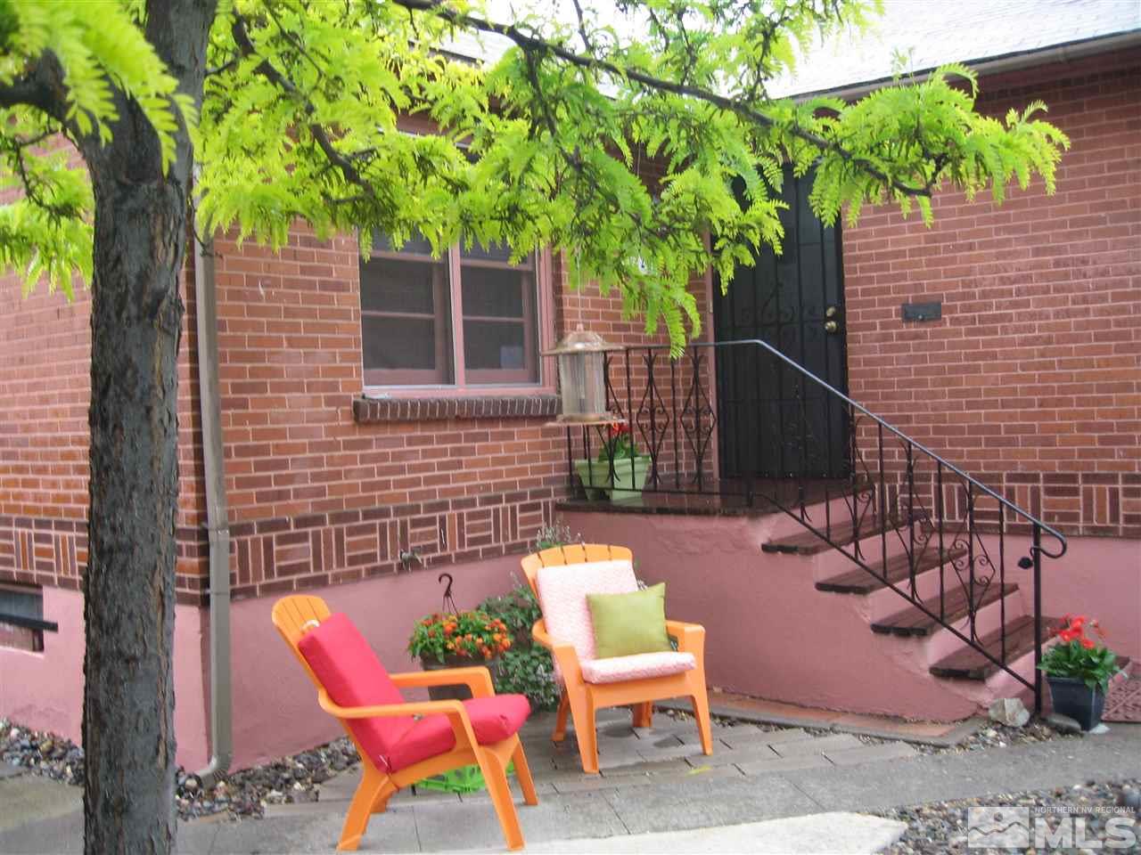 1220 Forest Street Reno, NV 89509 - Photo 2 of 25 a view of a chairs and table in backyard